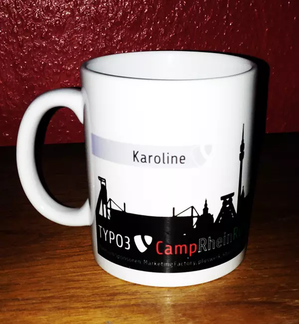 Tasse "TYPO3camp Rhein-Ruhr" mit Namensaufdruck "Karoline"